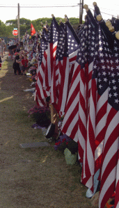 Flags-at-fence-memorial